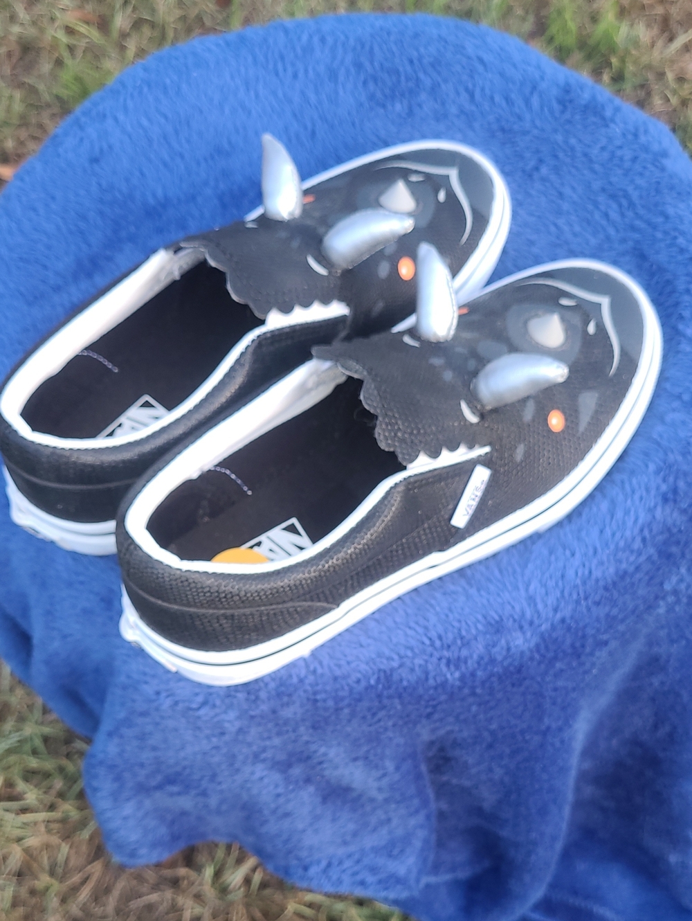 Vans Kids Triceratops Slip-On V shoes in black, featuring soft horns Size 3